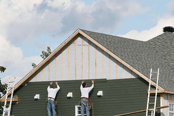 Professional Siding technician working in Fallston, MD